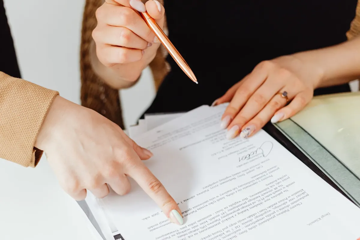 Professional reviewing prepared documents before approval